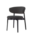 Sleek Casto dining chair with dark gray fabric upholstery and matching black wood legs