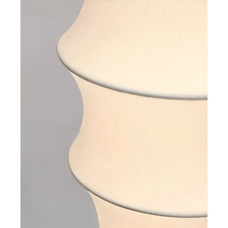 Close-up detail showing the stretched white silk fabric texture of the Celeste floor lamp