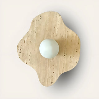 Celestia Marble & Glass Wall Sconce in flower beige travertine stone, front view.