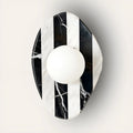 Celestia Marble & Glass Wall Sconce in long black and white striped marble, front view.