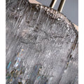 Close-up of clear textured K9 crystal glass panel with sculpted surface detailing and faceted crystal pendants below