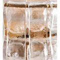 Detailed close-up of textured clear Murano glass panels on a contemporary Italian wall light fixture