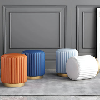 Set of orange, blue, light blue, and white makeup stools with gold bases – modern seating for stylish interiors