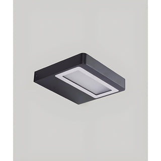 Close-up of compact square-shaped LED wall light with sleek aluminum body and white diffuser