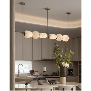 Solid copper and marble linear chandelier in modern kitchen design