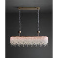 Coral pink K9 crystal linear chandelier with cascading faceted crystal droplets