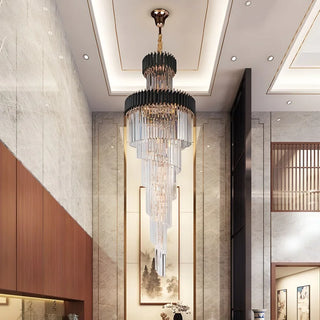 Black and gold art deco crystal chandelier hanging in a stairwell