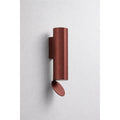 Contemporary tall outdoor wall light in bronze color from the DAWN series, designed with a vertically fluted aluminum body and a circular reflector plate for indirect lighting