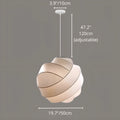 Elara white silk pendant light creating a cozy atmosphere in a bedroom