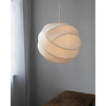 Close-up detail of the spiral seams on the Elara white silk pendant light