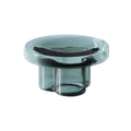 Emerald green sculptural glass coffee table with thick round top and low architectural base