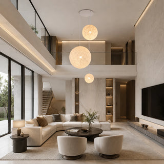 Filara woven ball cluster pendant with three globes in a double-height modern living room