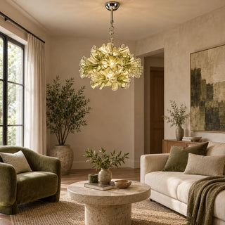 Fiorvella glass flower chandelier in a living room with green seating and a round coffee table