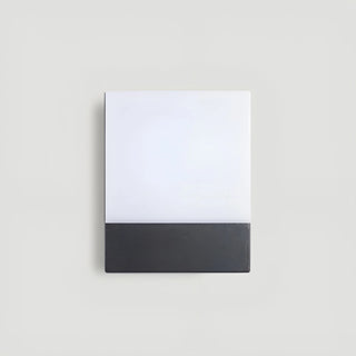 Front view of the LED wall light with a black aluminum base and frosted acrylic diffuser