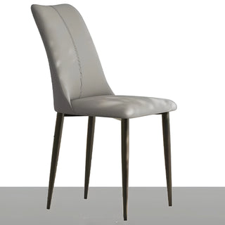Gray dining chair with contoured back and clean center stitching, upholstered in faux leather