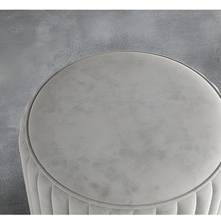 Top view of gray velvet makeup stool showing smooth fabric texture and elegant round shape