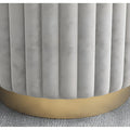 Close-up of gray velvet ottoman base with golden metal ring — modern Nordic design