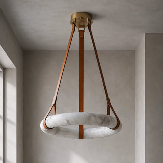 Halara alabaster ring chandelier hanging in a minimalist plaster corner by a window