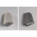 White and black sandstone wall sconces showcasing smooth handcrafted microcement finish