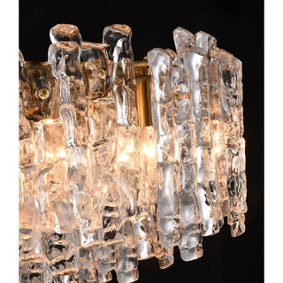 Illuminated close-up of textured Murano glass panels with warm ambient lighting