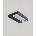 Close-up of large rectangular modern LED light with black and white aluminum finish