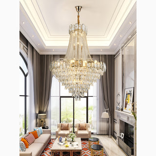 Large classic crystal chandelier with cascading crystals for a high-ceiling living room