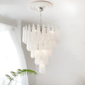 Large Murano-style textured glass chandelier in an elegant white interior setting