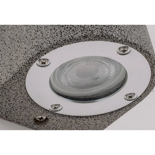 GU10 LED bulb detail in microcement lamp with polished aluminum rim