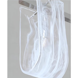 Close-up of Liora linear pendant light clear sculpted glass shade texture