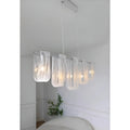 Liora linear pendant light in modern dining room angled perspective