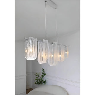 Liora linear pendant light in modern dining room angled perspective