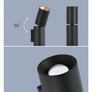 Close-up of Logic wall sconce with 90-degree rotating head and precision lens detail