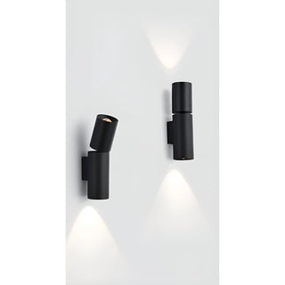 Two black outdoor adjustable wall-mounted lights on a white background