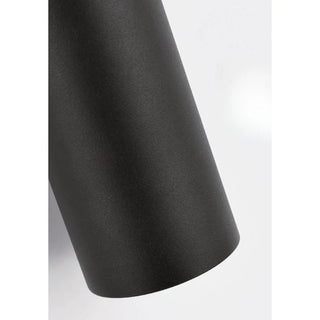 Macro view of the smooth anodized aluminum surface in matte black finish