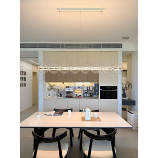 table.jpg
Full view of the Linear Glass Chandelier suspended over dining table
