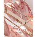 Close-up of Blush Pink glass discs and polished brass structure of Lumière Éclat rectangular chandelier