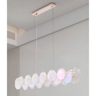 Lumière Éclat rectangular glass disc chandelier in Soft White finish suspended in a modern minimalist interior