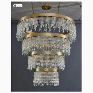Multi-level crystal chandelier with four graduated tiers