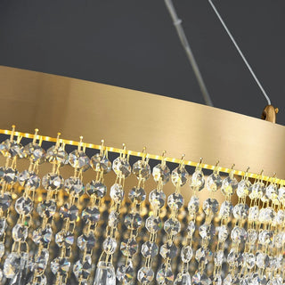 Chic gold chandelier with layered crystal tiers, adjustable suspension