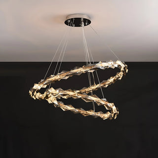 Luxury K9 crystal chandelier illuminating a modern living room with warm lighting