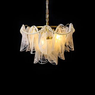 Luxury tiered glass chandelier with gold hardware on black background