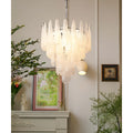 Luxury tiered textured glass chandelier in a sophisticated modern interior
