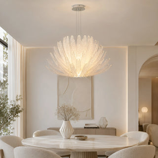 Lysara Tiered Crystal Leaf Chandelier installed above a modern dining table in a luxury dining room