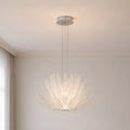 Lysara Tiered Crystal Leaf Chandelier creating elegant ambient lighting in a luxury bedroom interior