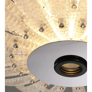 Close-up detail of the Lysara Tiered Crystal Leaf Chandelier showcasing textured crystal leaves and integrated LED illumination