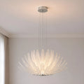 Suspended Lysara crystal leaf chandelier featuring a polished nickel canopy and radiant LED illumination.