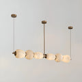 Minimalist marble linear chandelier with solid copper suspension and warm LED light