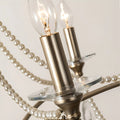 Close-up of candle-style lights on the Marcelline Pearl French crystal chandelier