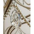 Close-up of crystal drop and pearl garland detail on the Marcelline Pearl chandelier