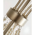 Close-up of the brushed antique champagne metal finish on the Marcelline Pearl chandelier